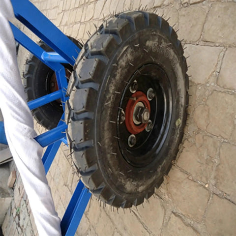 Beast Mode Heavy Duty Utility Pole Dolly With 2 Wheels For Concrete Power Poles And Site Transport Cart, Sturdy Welded Steel Frame, Thick Pneumatic Tires, Portable Hand Cart For Quick, Easy Pole Handling On The Job, blue steel frame with thick pneumatic tire close-up