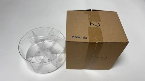 Clear acrylic marker organizer with 360 degree rotating pencil and crayon holder next to packaging box, 250 piece set