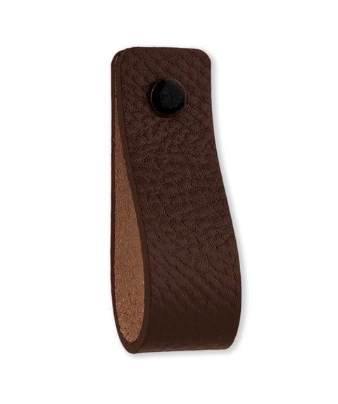 Close-up of a single brown leather drawer pull from the 12-piece set, featuring black screw, sized 6.5 x 1 inches for furniture use.