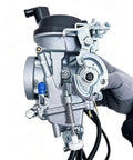 Close-up of Carburetor For V Star 1100 XVS1100 Silverado Classic Custom 1999 2009 Replacement Part with metal details.