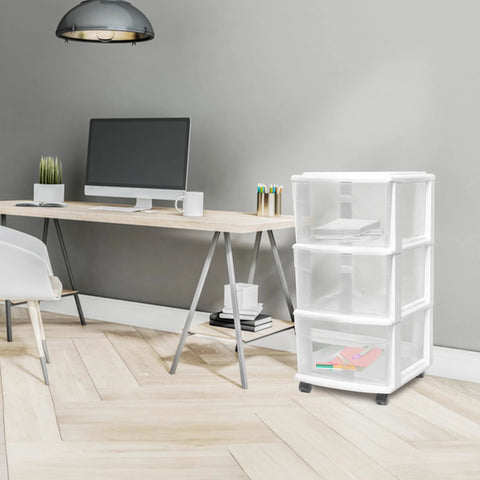 Three Tier Rolling Storage Cart With Removable Wheels in white frame next to a desk setup in a home office