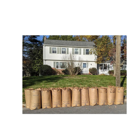 30 Gallon Lawn And Leaf 2 Ply Heavy Duty Yard Waste Paper Bags in front of suburban house, biodegradable and compostable, made in USA
