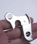 Hand holding Derailleur Hanger 43 GH002 Replacement For Nishiki Back Roads Colorado Raleigh F500 M40 CNC Alloy Silver Dropout