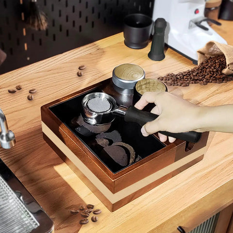 Professional Grade Wooden Espresso Knock Box And Sleek Tamping Station With Beefy Stand Base For Real Hustle Fits Standard 58mm Portafilters Home Barista Setup with coffee grounds on counter.