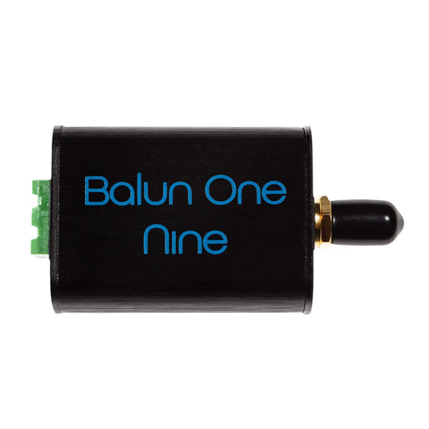 Compact 9 To 1 Balun With Input Protection In Aluminum Enclosure, black casing, for HF and Shortwave Antennas, top view angle.