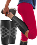 Person stretching wearing black calf compression sleeves, red leggings, promoting leg support and shin splint relief. Calf Compression Sleeves For Men And Women Unisex Leg Support For Recovery Shin Splint Pain Relief Travel Ready Air Travel Comfort Get You Back In Action Running Basketball Football Soccer Maternity Black XL.