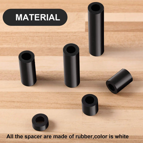 Outlet Spacer Kit With 120 Non-Threaded 6mm Rubber Spacers, Assorted 6 Sizes, Black spacers on wooden surface