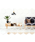 Hexagon Mirror Wall Stickers Set Removable Silver Acrylic Honeycomb Decals reflecting living room decor with sofa and table