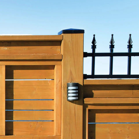 Eazy Pyramid Cap For 6x6 Posts Black Built To Last Heavy Duty Steel Post Cap on wood fence with black metal accents.