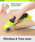 Wisyok Cordless Electric Scissors With 4.2V Rechargeable Battery cutting cardboard effortlessly with ergonomic grip.