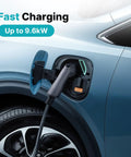 Plug And Play Heavy Duty J1772 EV Charger Extension Cable 40 Amp 20 Foot Level 1 And Level 2 Electric Vehicle Charging Cord connected to EV.
