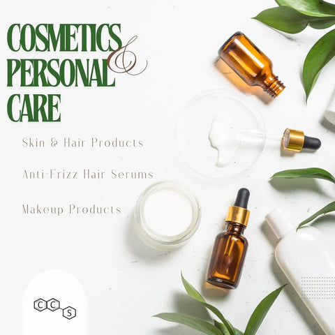 Assorted cosmetics and personal care products with green leaves on white background