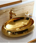 Top Shelf Ceramic Vessel Sink With Faucet Oval Countertop Wash Basin in glossy gold finish on bathroom counter.