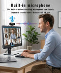 Slick 1080P HD Webcam For PC And Laptop With Dead Quiet Noise Canceling Mic And Plug And Play Setup For Smooth Video Calls in use during a video conference.