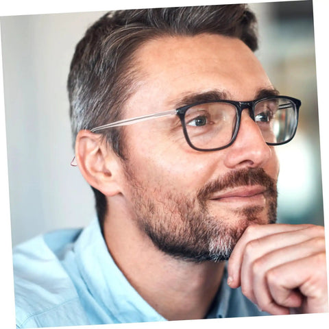 I don't know who this person is, but they are wearing eyeglasses with a contemplative expression.