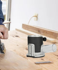 Heavy Duty Round Router Base For Trimming Machines Smooth Rolling Stand For Woodworking Power Tools on a workshop table.