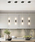 Sleek Dimmable LED Mini Pendant Light Set For Kitchen Island And Bar Black And Gold Finish illuminating modern kitchen.