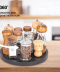 Premium Wood Lazy Susan Turntable Functions As Slick Kitchen Game Changer With Smooth Swivel Glide Waterproof 11 Inch Black Round Serving Tray with spices.