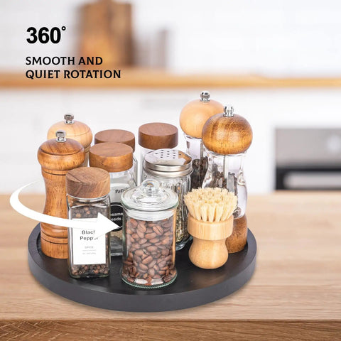 Premium Wood Lazy Susan Turntable Functions As Slick Kitchen Game Changer With Smooth Swivel Glide Waterproof 11 Inch Black Round Serving Tray with spices.