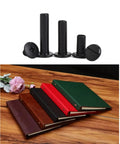 Badass Chicago Screws Binding Post Assortment Kit 120 Piece with black binding posts and various leather-bound books.