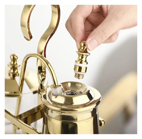 Top Shelf Siphon Coffee Maker Syphon Glass Brewer 4 Cup with a hand attaching the metal part, showcasing its ergonomic design.