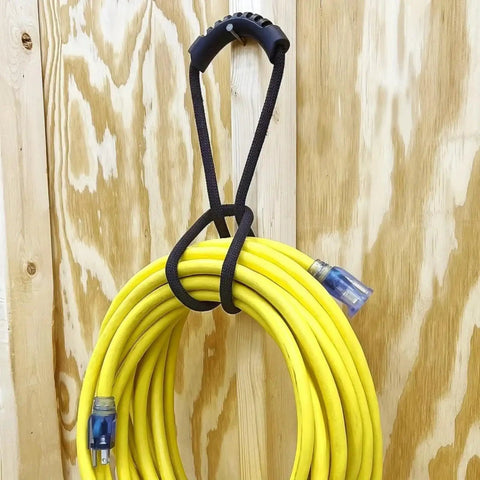 Heavy Duty Nylon Cord Strap Organizer Rope For Tailgate Parties And Campouts Holds Generator Cords Tight on a yellow cord.