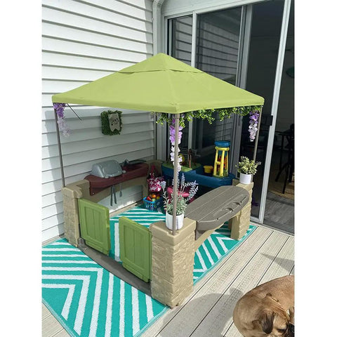 All Around Playtime Patio Canopy Replacement For Outdoor Play Kitchen Playset, green polyester shade over playhouse area.