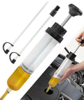 Heavy Duty Auto Fluid Extractor Pump With Non Drip Silicone Tubes For Slick Power Steering And Brake Oil Transfer Zero Mess Tool in use.