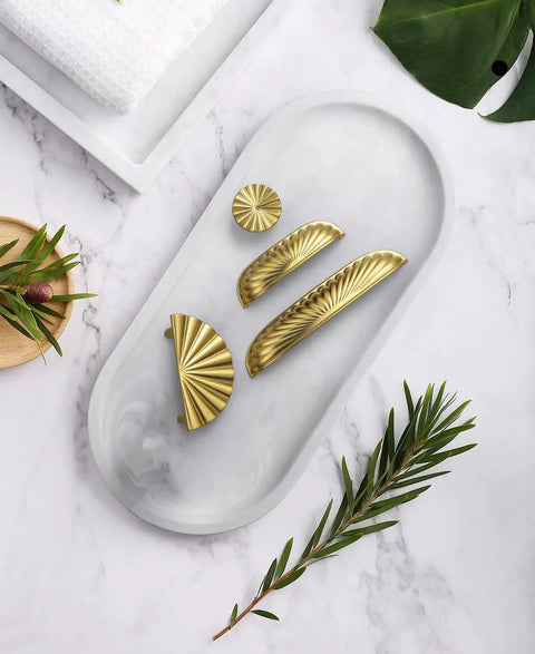 Top Shelf Modern Cabinet Pulls With 5 Inch Hole Centers And Brushed Gold Zinc Alloy Handles For Kitchen Drawers And Furniture Doors Six Pack showcasing elegant gold handles on a marble tray.