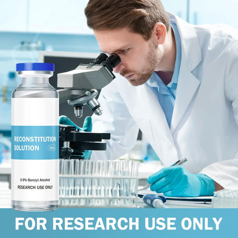 Front view of a 30ml glass vial with blue cap labeled Reconstitution Solution in a lab, scientist using a microscope.