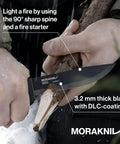 Carbon Steel Fixed Blade Bushcraft Knife With Sheath 4.3 Inch Blade used to carve wood, DLC Coated, rugged outdoor use