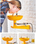 Person using Emergency Eye Wash Station Wall Mounted With Eyewash Sign Dual Spray Faucet Stainless Steel And ABS Housing