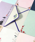 Vintage style envelope and paper from the Ultimate 91 Piece Stationery Set With 60 Lined Writing Papers, 30 Envelopes, and 48 Stickers.