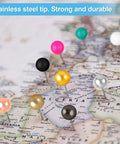 Super Dope 810 Piece Assorted Color Map Push Pins With Heavy Duty Stainless Steel Needles And Vivid Plastic Balls on a map.