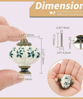 Hand holding and displaying ivory ceramic pumpkin knob with dimensions, part of Ivory Ceramic Pumpkin Knobs 12 Pack For Cabinets And Dressers Vintage Green Flower Pulls With Screws Included Antique Dresser Hardware Dope Vintage Vibe For Kitchen Cabinets Vanities Desks And Furniture Renovations set.