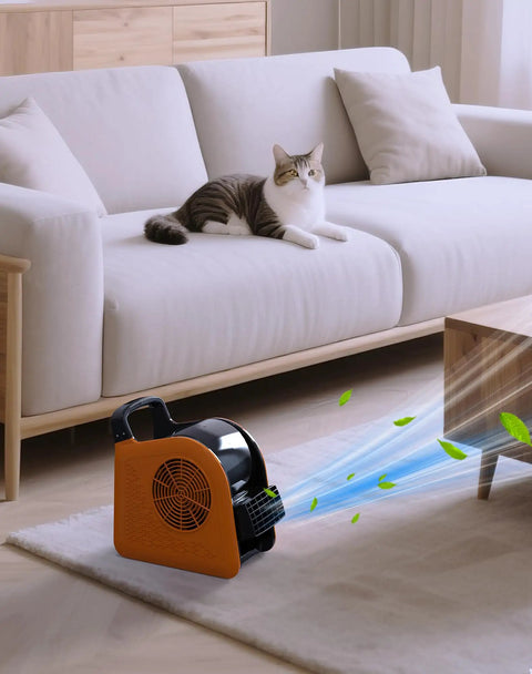 Heavy Duty Air Mover Blower Fan For Drying, Cooling, And Ventilating At Home, orange unit on floor, air flowing in living room.