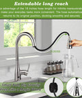 Person using Touchless Kitchen Faucet With Sensor, Pull-Down Sprayer, Brushed Nickel Finish in kitchen with window view