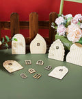 DIY Fairy House Kit 48 Pcs Unfinished Wood Doors And Windows For Miniature Garden Decor shown with floral backdrop.