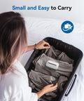The Real Deal Plug In CO Gas Detector With 10 Year Sealed Battery Plus AC Backup showing in a suitcase with folded clothes.