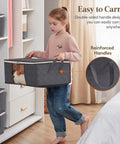 Child carrying Three Pack 35L Foldable Storage Bins With Lids And Zippers, Clear Window for Easy Viewing, Reinforced Handles for Heavy Loads.