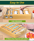 Slick Bamboo Kitchen Drawer Organizer With Plastic Wrap Dispenser And Foil Cutter, 6 In 1 Multi Size Bag Holder For Quart And Gallon Storage showcasing bag slots and dispensers.