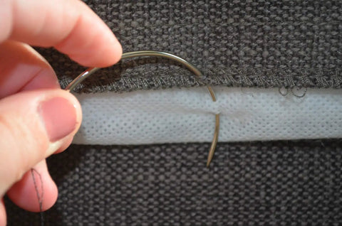 Using Extra Strong Upholstery Repair Thread Kit Pro Grade With Heavy Duty Curved Needles on dark fabric