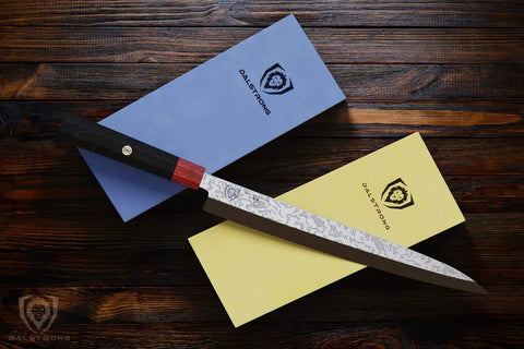 Premium Whetstone Kit With 3000 And 8000 Grit, Extra Large Stones, knife alongside two colored cases on wooden surface