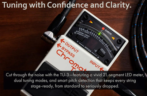 Top view of Chromatic Tuner Pedal Bundle with High Brightness LED Meter Accu Pitch Sign Guitar and Bass Modes on wooden surface.