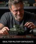Man assembling M4 Sherman Tank Building Kit For Adults, Realistic WW2 Military Model You Can Build And Show Off, 860 Pieces