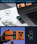 Magnetic Portable iPhone SSD For ProRes 4K 60fps Video 2TB External Storage next to laptop and iPhone with LCD display visible