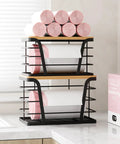 Two Pack Stackable Trash Bag Holder And Dispenser With Bamboo Top For Laundry And Kitchen Storage No Drill Wall Mount Organizer Great For Small Spaces And Busy Kitchens Keeps Bag Rolls Ready, shown stacked with pink bag rolls on a countertop.