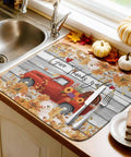 Set Of 2 Absorbent Microfiber Dish Drying Mats For Kitchen Counter 16 X 18 Inches Machine Washable Fall Autumn Thanksgiving Sunflower Red Truck Wood Grain Design Cozy Holiday Decor And Durable Non Slip Pad on kitchen counter with sunflower and red truck design.
