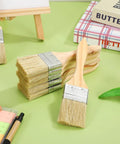 30 Piece 12mm Flat Stain Brush Set With Thick Wood Handles for decks, fences, trim, and interior exterior walls on table