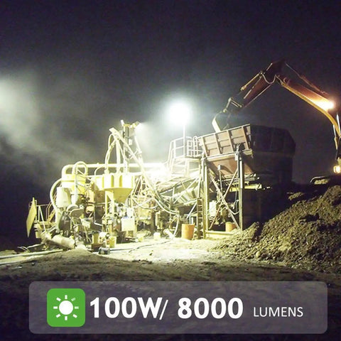 Spot Lighting Rechargeable Cordless Led Work Light Portable Floodlight illuminating a construction site at night.